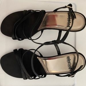 Unlisted black strap heel